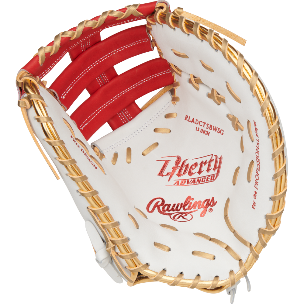 A close-up of the Rawlings Liberty Advanced Color Sync 13" Fastpitch First Base Mitt (RLADCTSBWSG) shows tan laces, red stitching, and the inner palm and webbing, featuring Rawlings branding and text throughout.