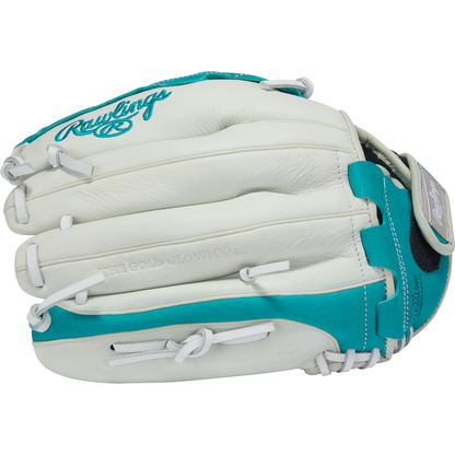A white and teal Rawlings Shut Out 12.5" Fastpitch Glove (RSO125W) features visible stitching, laces, the Rawlings logo, and "The Gold Glove Co." embossed on the leather.