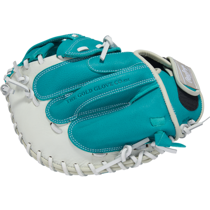 A teal and white Rawlings Shut Out 31.5" Fastpitch Catcher's Mitt (RSOCM315W) with white laces, featuring "THE GOLD GLOVE CO." printed on the palm.