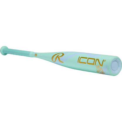 The 2026 Rawlings ICON CHOSEN ONE (-10) USA Baseball Bat features a light teal design with gold "ICON" and "The Hype is Real" lettering, a teal grip, composite construction, and the Rawlings logo near the barrel.