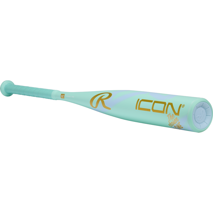The 2026 Rawlings ICON CHOSEN ONE (-10) USA Baseball Bat features a light teal design with gold "ICON" and "The Hype is Real" lettering, a teal grip, composite construction, and the Rawlings logo near the barrel.