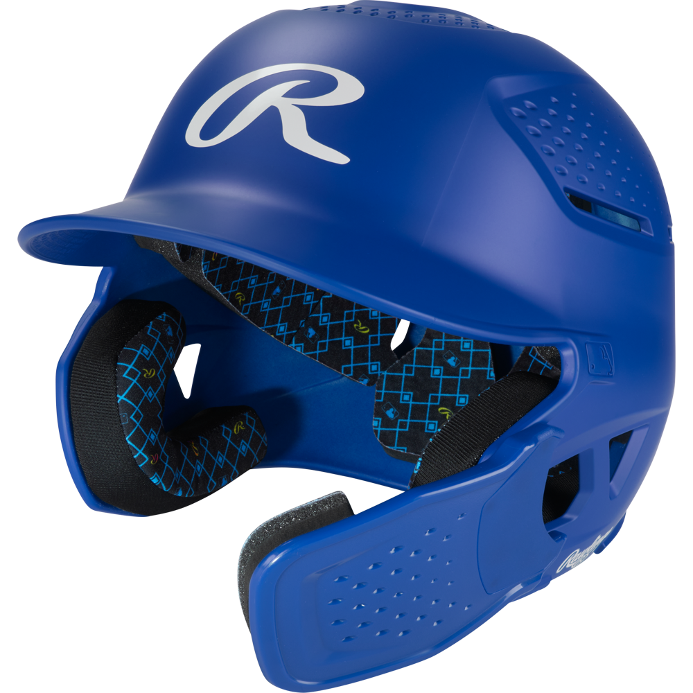 A Royal Rawlings RX2 Reverse Matte Batting Helmet with a protective face guard, black patterned interior padding, ventilation holes, reversible flap system, NOCSAE-certified protection, and a white R logo on the front.