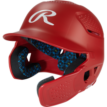 The Rawlings RX2 Reverse Matte Batting Helmet: RX2REVMAT in scarlet features a reversible flap system, protective face guard, blue patterned interior padding, ventilation holes, and offers NOCSAE-certified protection for every player.