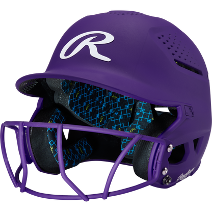 A purple Rawlings RX2 Matte Batting Helmet with Fastpitch Mask features ventilated sides and blue-and-black patterned interior padding.