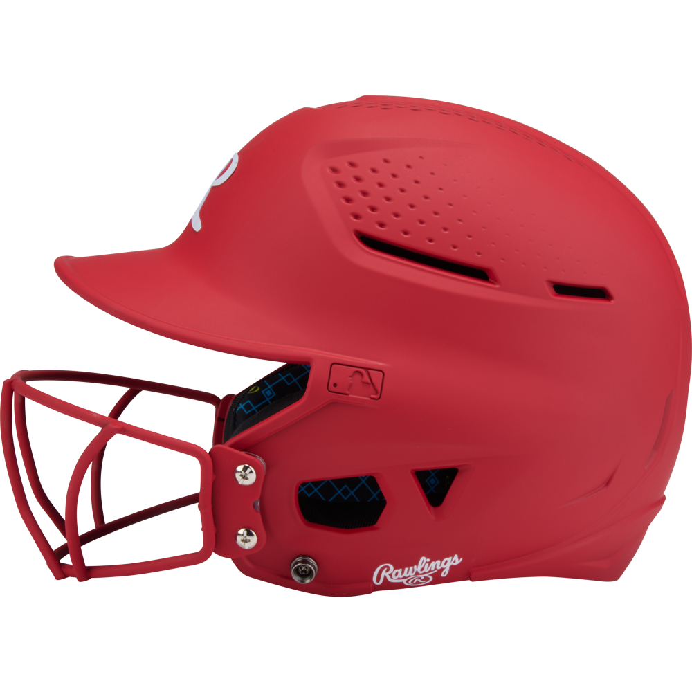The Rawlings RX2 Matte Batting Helmet with Fastpitch Mask (RX2SBMAT) is shown in side profile, featuring ventilation holes and a white Rawlings logo near the ear, set against a plain background.