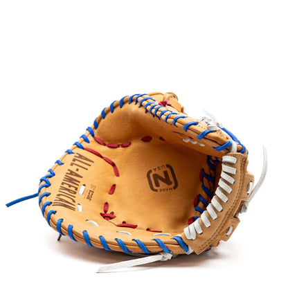 Tan leather Nokona S1 All-American 12.5″ Baseball First Base Mitt: S1-EPN60POP laced with blue and white cord, featuring the words All-American embossed on the palm.
