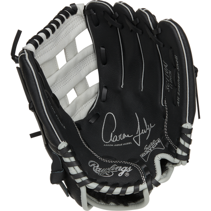 The Rawlings Sure Catch 11" Aaron Judge Youth Baseball Glove (SC110AJ) features a black and white design with white laces and Aaron Judge's signature on the palm.