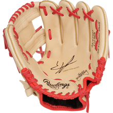 The Rawlings Sure Catch 9.5" Jeremy Pena Youth Baseball Glove (SC950JP) features tan leather, red laces, and stamped logos inside the palm.