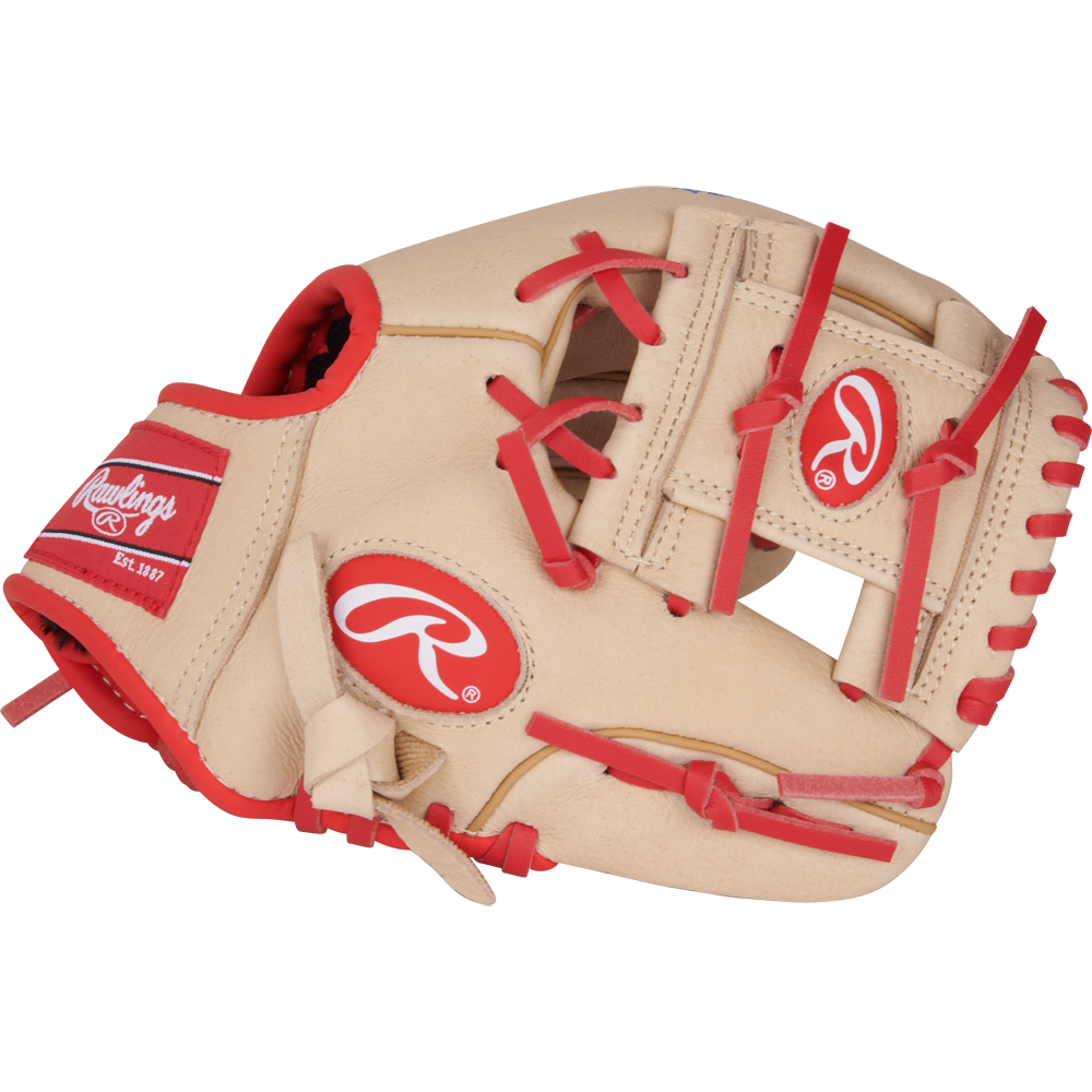 The Rawlings Sure Catch 9.5" Jeremy Pena Youth Baseball Glove (SC950JP) is a tan glove with red laces and accents, featuring the Rawlings logo on the wrist strap and back.