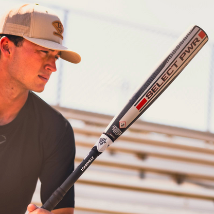 A man holding the 2026 Louisville Slugger Select PWR (-3) BBCOR Baseball Bat (WBL4115010), a favorite among power hitters.