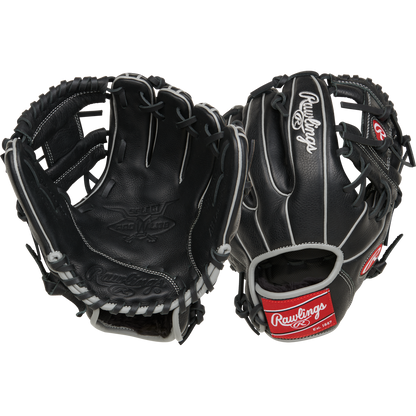 Two black Rawlings Select Pro Lite 10.5" Carlos Correa youth baseball gloves (RSPL105CC) with white laces and stitching, shown from palm and back; each displays the Rawlings logo in white and a red patch near the wrist.