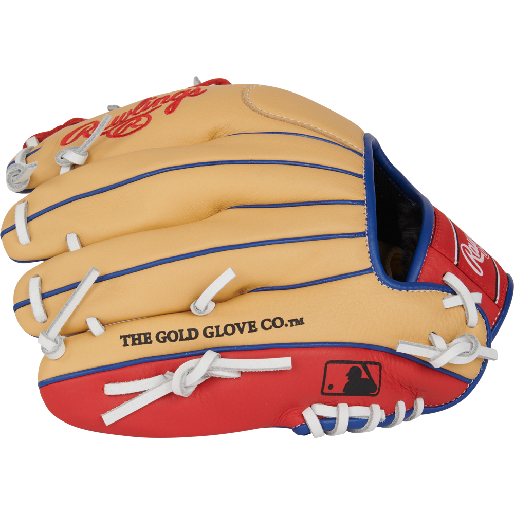 A tan, red, and blue Rawlings Select Pro Lite 11" Corey Seager baseball glove (SPL110CS) with white laces, featuring THE GOLD GLOVE CO. and the MLB logo on the side.