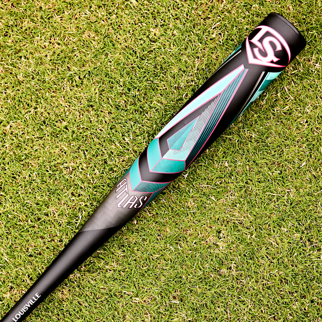 The 2025 Louisville Slugger Atlas (-3) BBCOR Baseball Bat: WBL2968010 (DEMO) from Louisville Slugger rests on the grass, highlighting its sleek one-piece alloy design.
