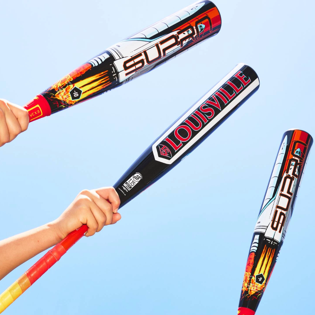 Three hands grip colorful bats against a clear blue sky; two are SUPERA models with flame graphics, and the center is the 2026 Louisville Slugger Supra Starship (-10) USSSA Baseball Bat: WBL4183010.