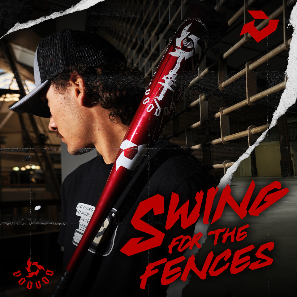 A baseball player wearing a dark cap and shirt rests a red bat with white graphics on his shoulder. Bold red text reads Swing for the Fences over a dark background with geometric designs.