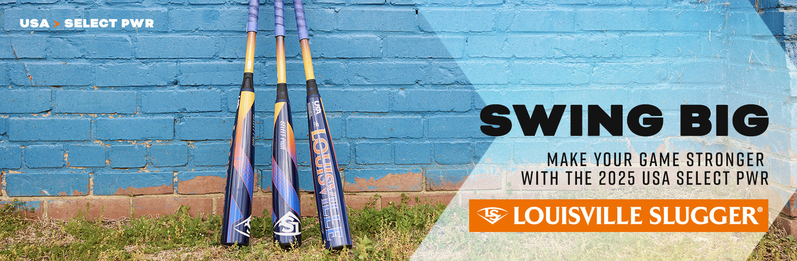 Three Louisville Slugger baseball bats stand against a blue brick wall. Text reads: “SWING BIG. Make your game stronger with the 2025 USA Select PWR. Louisville Slugger.” Grass and dirt are visible at the bottom.