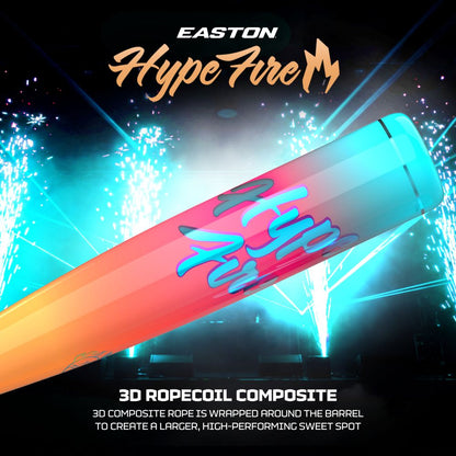 A vibrant Easton 2027 Hype Fire (-11) 2 5/8″ USA Baseball Bat (EUS7HYP11) is pictured against an explosive backdrop of blue fireworks. The image emphasizes its advanced 3D Ropecoil Composite technology and ConneXion Max handle from Easton, designed to deliver a larger, high-performing sweet spot for maximum power.