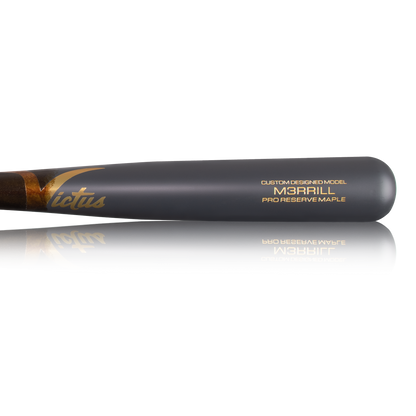 A close-up of the Victus Jackson Merrill M3RRILL Pro Reserve Maple Wood Bat (VRWMM3RRILL) in black with gold text and Victus logo; its reflection appears on the white background.