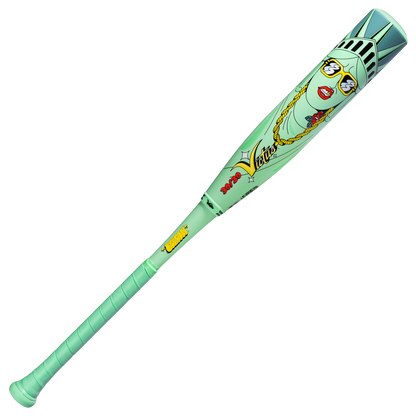 The Victus 2027 Nova Lit Beacon (-10) USSSA bat features a mint green composite XL barrel with a cartoon Statue of Liberty in glasses, red lipstick, and gold chains, plus "Vatos x Venus," echoing bold designs typical of Victus.