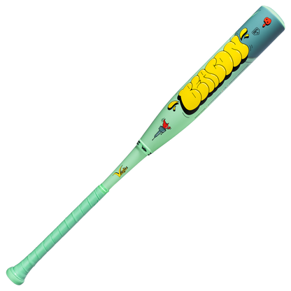 The 2027 Victus Nova Lit Beacon (-8) USSSA baseball bat features mint green carbon fiber, an XL barrel, yellow graffiti-style BRONX text, and cartoon graphics including a red rose, gray skull, and small red heart.