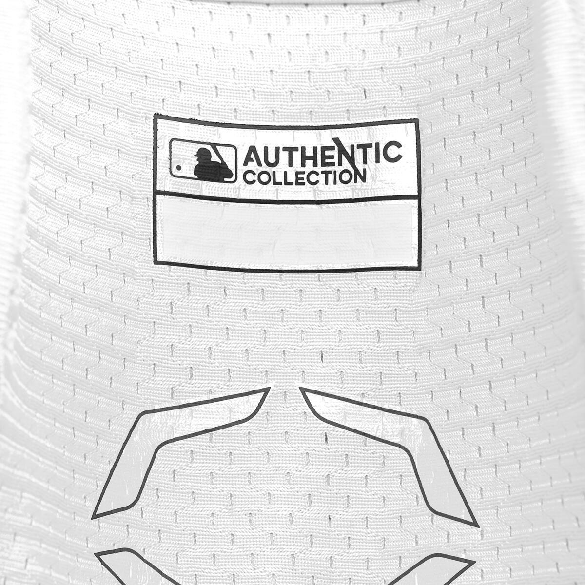 Close-up of a white EvoShield PRO-SRZ 2.0 Batter's Elbow Guard (WB572600) jersey with “AUTHENTIC COLLECTION” MLB logo patch, a blank label, and a gray geometric design inspired by the guard’s advanced fabric technology.