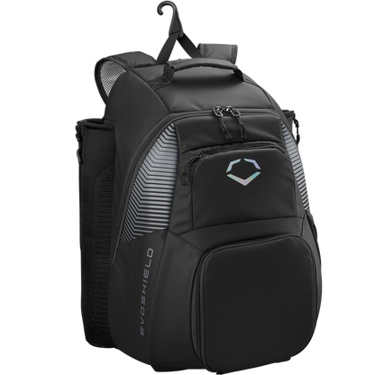 The EvoShield Tone Set Backpack (WB57304) is a black, water-resistant gear bag with multiple zippered compartments, padded shoulder straps, mesh side pockets, bat sleeves, a top hanging hook, and a white EvoShield logo.