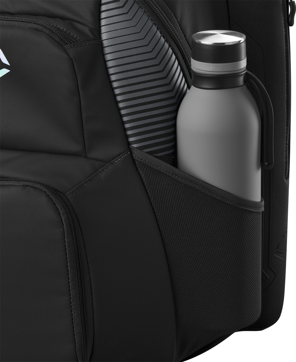 A close-up of the EvoShield Tone Set Backpack (WB57304) by EvoShield shows its water-resistant side pocket holding a gray water bottle, with a striped item, possibly a laptop or tablet, visible beside it.