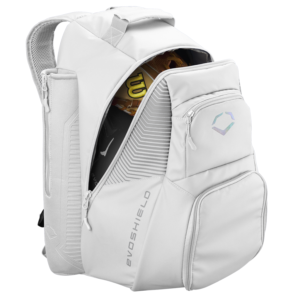 The EvoShield Tone Set Backpack: WB57304 is a white, water-resistant bag with multiple zippered compartments—one partly open to reveal a tan baseball glove. It features the EvoShield geometric logo, padded straps, and dedicated bat sleeves for your baseball gear.