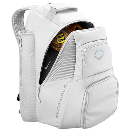 The EvoShield Tone Set Backpack: WB57304 is a white, water-resistant bag with multiple zippered compartments—one partly open to reveal a tan baseball glove. It features the EvoShield geometric logo, padded straps, and dedicated bat sleeves for your baseball gear.