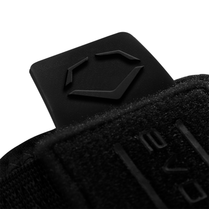 The EvoShield Sliding Mitt 2.0 (WB57537) by EvoShield is a black baseball sliding mitt with a black square, designed to protect your hand during slides.