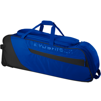 The EvoShield Takeover Wheeled Bag (WB57572) is a large blue and black baseball gear bag with a top handle, side pocket, bat sleeves, wheels for easy transport, and the EVOSHIELD logo embossed on the side.