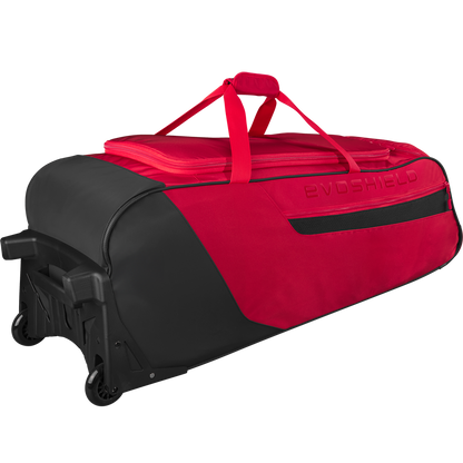 The EvoShield Takeover Wheeled Bag (WB57572) by EvoShield is a large red and black bag with bat sleeves, zippered top, two handles, and reinforced corners—ideal for athletes as a durable baseball gear or travel bag.