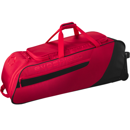 The EvoShield Takeover Wheeled Bag (WB57572) is a spacious red and black baseball gear bag with wheels, handle, shoulder strap, zippered pocket, bat sleeves, and EVOSHIELD branding on the side.