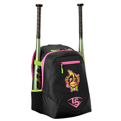 The Louisville Slugger Party Animals Powerized Stick Pack Backpack (WB5763701) is a black youth bag with pink and neon green accents, a cartoon monkey face, two side mesh bat pockets, and a white Louisville Slugger logo at the bottom.