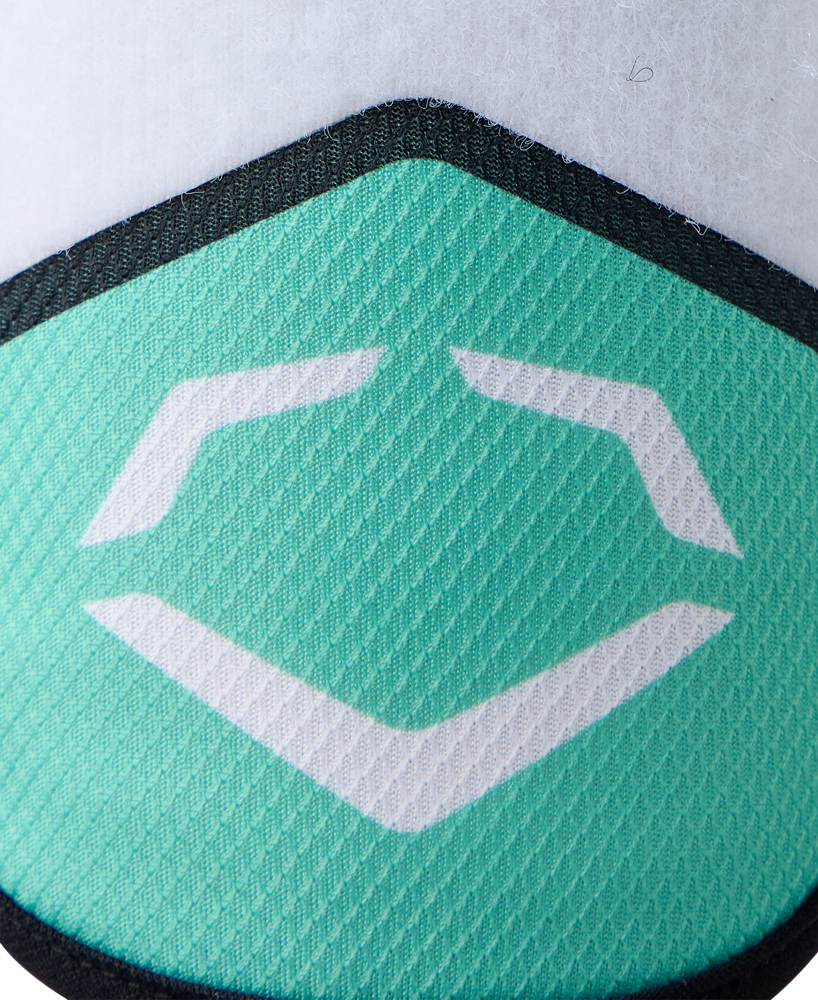 Close-up of a textured turquoise surface featuring EvoShield’s white geometric logo, outlined in black, on a white background. Inspired by the EvoShield SRZ-2 Youth Batter's Elbow Guard: WB57645, renowned for its Gel-to-Shell technology.