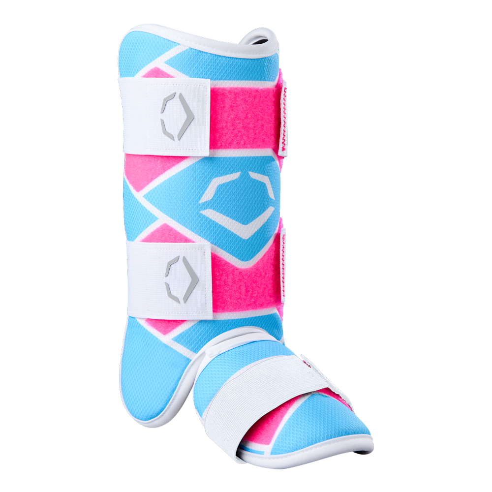 The EvoShield SRZ-2 Youth Batter's Leg Guard (WB57646) by EvoShield features bold blue, pink, and white geometric patterns, two white Velcro straps, and a reinforced foot section—designed for young batters.