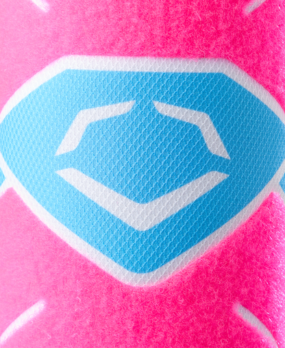 Close-up of a batters leg guard with a pink background and a blue and white geometric design inspired by the EvoShield SRZ-2 Youth Batter's Leg Guard (WB57646) by EvoShield.