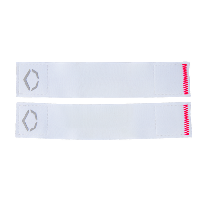 Two white fabric bands from the EvoShield SRZ-2 Youth Batter's Leg Guard (WB57646) by EvoShield show a gray geometric logo on one end and red zigzag stitching on the other, laid flat against a plain white background.