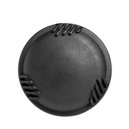 A round, black object with a smooth domed center and three sets of parallel grooves along its edge, reminiscent of the precision engineering in the DeMarini The Goods (-8) USSSA Baseball Bat (WBD2536010), sits on a plain white background.