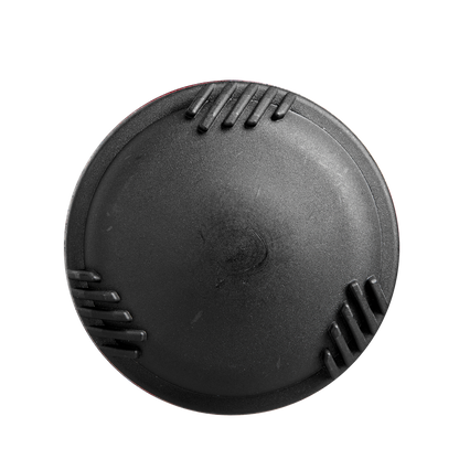 A black, round plastic camera lens cap with textured grip edges sits against a white background, echoing the refined precision of the 2025 DeMarini Voodoo One (-8) 2 3/4" USSSA Baseball Bat: WBD2539010 (DEMO) by DeMarini.