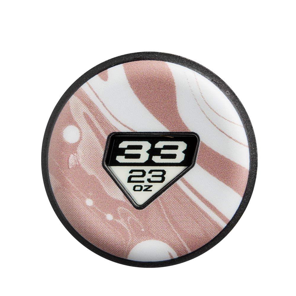 A round white and pink swirled object resembling a 2025 DeMarini Whisper (-10) Fastpitch Softball Bat: WBD2544010 features a black-edged diamond label, with "33" above "23 oz" in bold black at the center, echoing DeMarini's signature design.