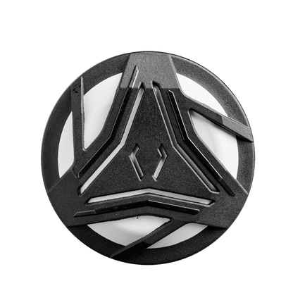 A round black and white object with a geometric, futuristic design of intersecting lines, inspired by the advanced engineering of the DeMarini 2025 Whisper (-10) Fastpitch Softball Bat (WBD2544010), shown from above against a white background.