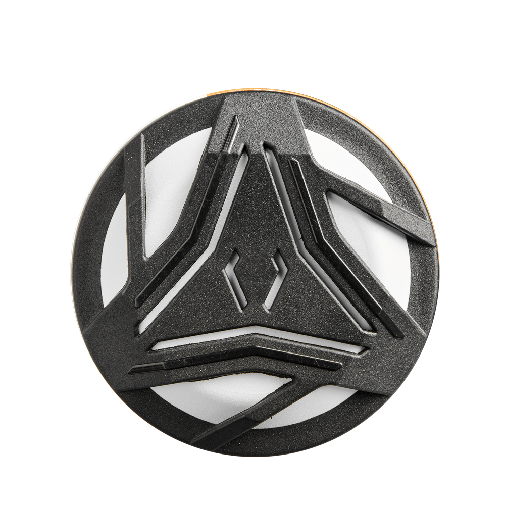 A round object with a white base and black angular, intersecting lines resembles the Gapped Wall Barrel tech of the 2025 DeMarini Prism+ (-11) Fastpitch Softball Bat: WBD2547010 (USED) by DeMarini, viewed from above on a plain background.