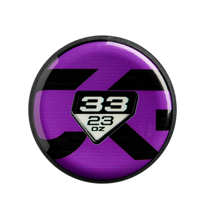 Inspired by the advanced Paraflex Plus Composite in DeMarini's 2025 CF (-10) Fastpitch Softball Bat (WBD2550010), this round purple hockey puck features bold black markings and a white shield displaying "38" and "2.3 oz" in black text.