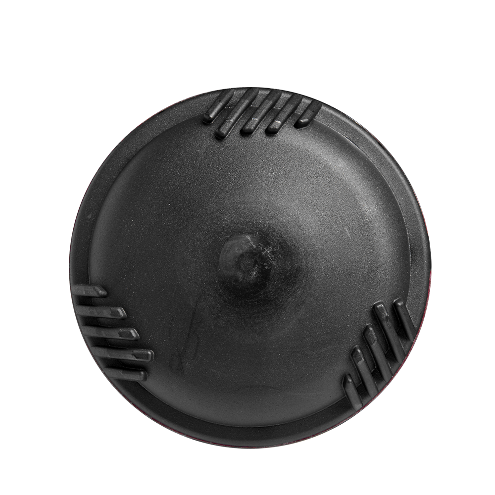 A black, circular object with a smooth, domed surface and four sets of parallel grooves, similar to parts on the 2025 DeMarini Voodoo One (-5) USSSA Baseball Bat (WBD2556010 DEMO) by DeMarini, shown on a white background.