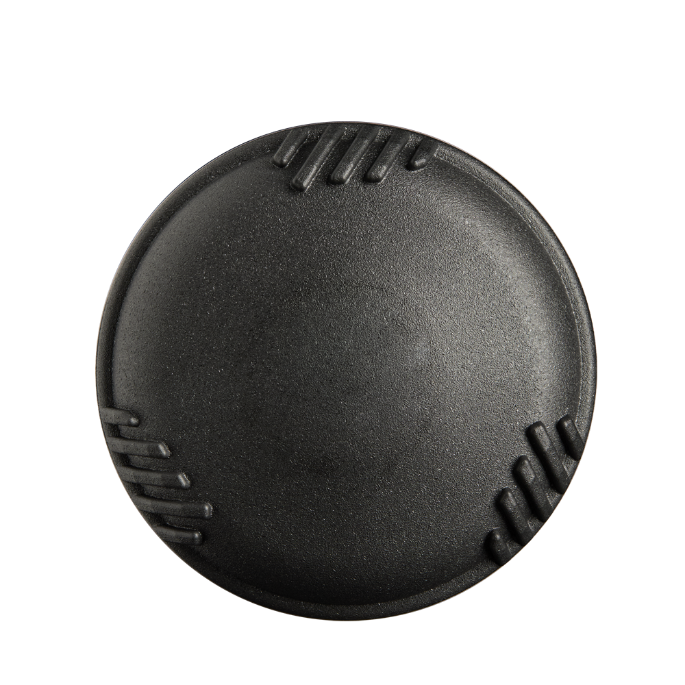 A round, black, textured object with three sets of parallel grooves around its edge, reminiscent of the 2025 DeMarini Voodoo One Rose Gold (-3) BBCOR Baseball Bat: WBD2628010 by DeMarini, photographed on a plain white background.