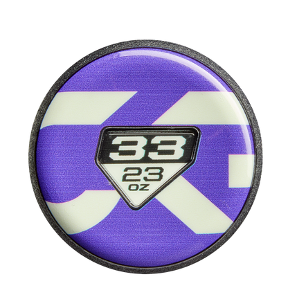 Celebrate your favorite bat with a round pin featuring a purple and white background and center badge displaying 38 above 23 oz—perfect for fans of the DeMarini CF FE (-10) Fastpitch Softball Bat: WBD2631010.