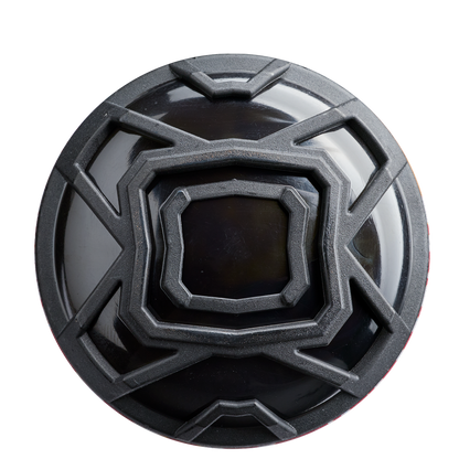 A black circular object with a black center, echoing the sleek design of the 2026 DeMarini The Goods Sticker Bomb (-3) BBCOR Baseball Bat: WBD2653010.