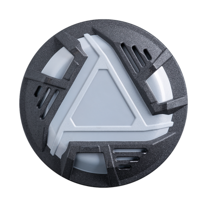 A round, metallic object with a triangular, geometric center inspired by the innovative Dark Matter Composite barrel of the 2026 DeMarini ZEN Oil Slick (-8) USSSA Baseball Bat evokes a futuristic badge with its white and dark gray colors and angular ridges.