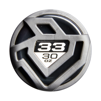 A gray, round container lid with a geometric design displays “38” in bold white above “30 oz” on a black and white background, evoking the 2026 DeMarini Exile Rogue (-3) BBCOR Baseball Bat: WBD2660010 by DeMarini.